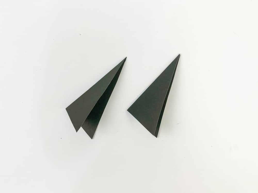 fold black triangle in half