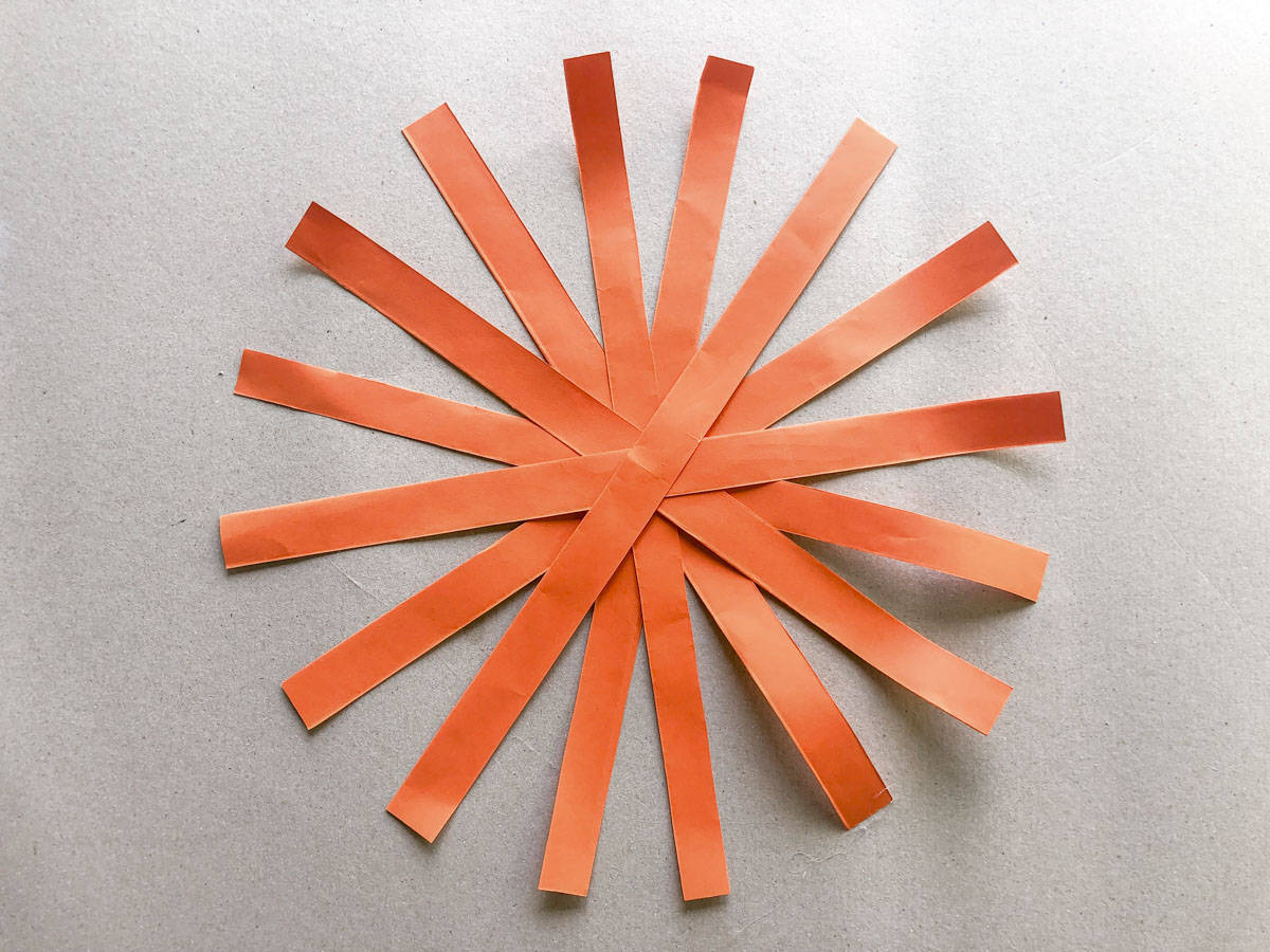 glue all strips on top of each other for paper pumpkin