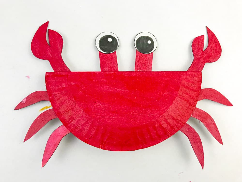 glue eyes to paper plate crab