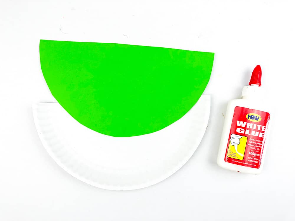 glue green paper to paper plate