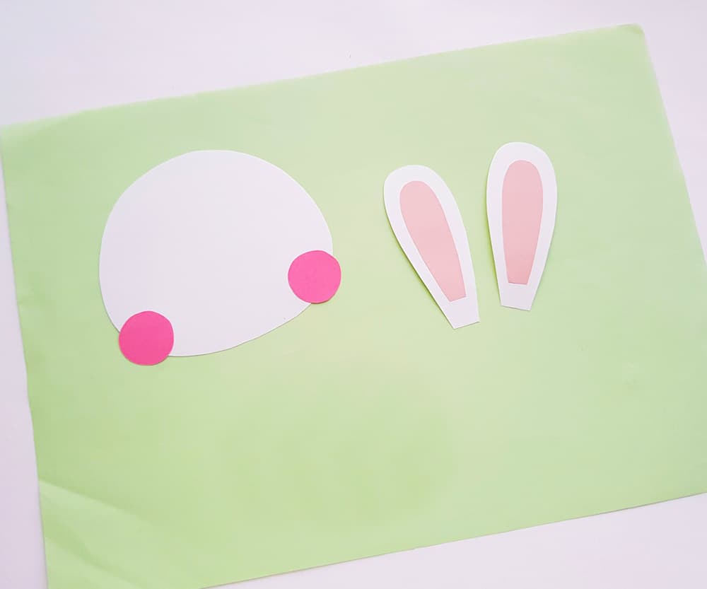 glue pink cheeks on bunny and inner ear on white ear