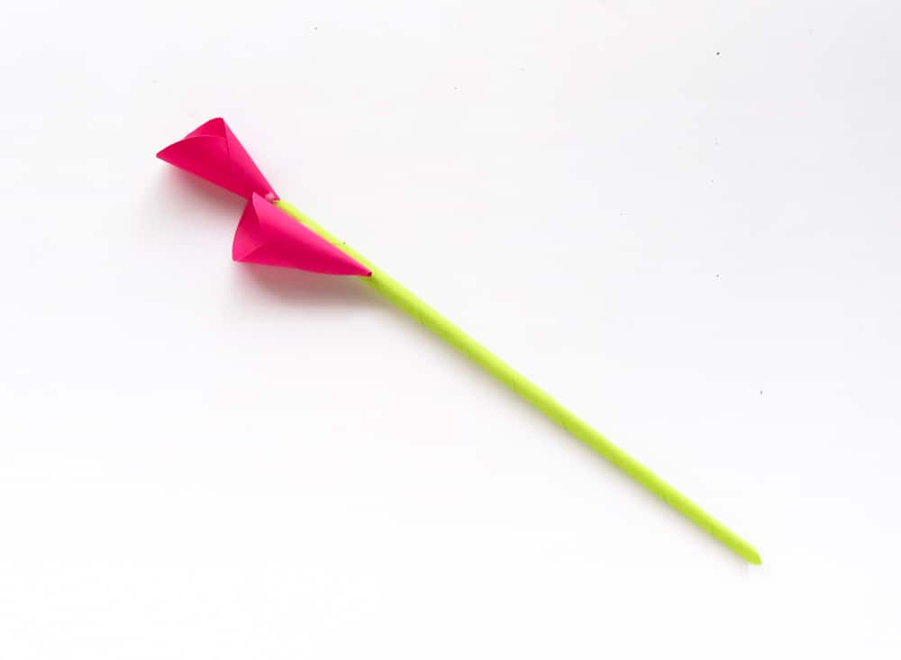 glue second petal to side of green stick