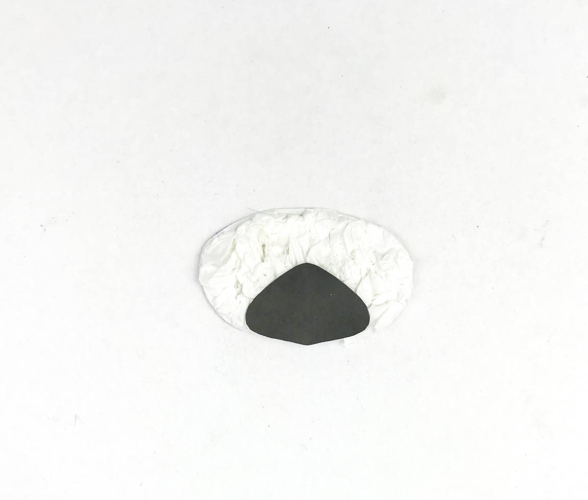 glue tissue paper to polar bear snout