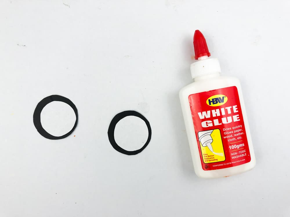 glue white circle to black circle