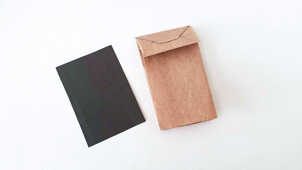 grab black rectangle and paper bag