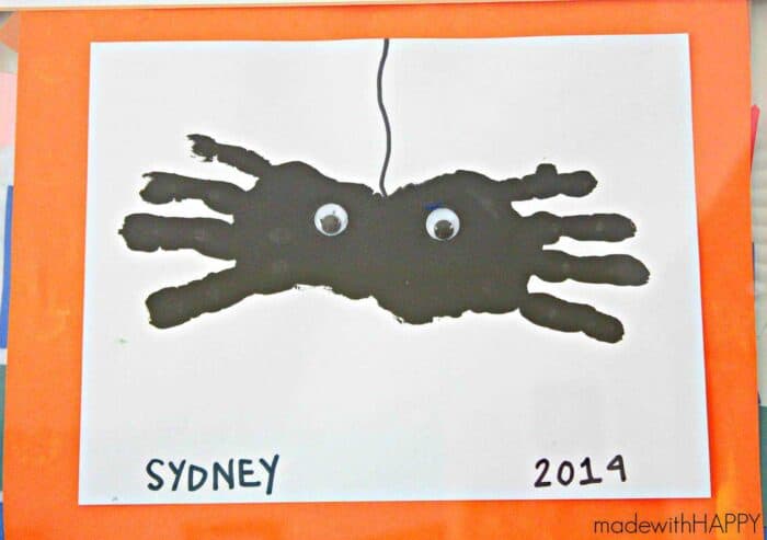 hand print spider with google eyes