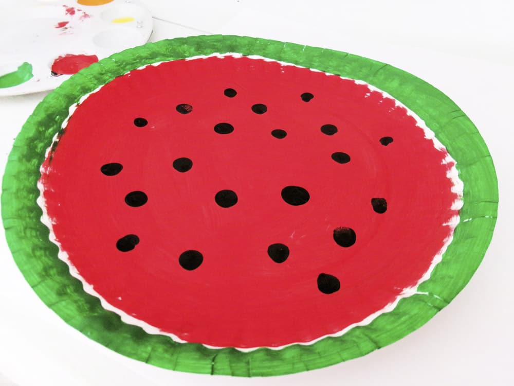 Let finger painted seeds of watermelon craft dry