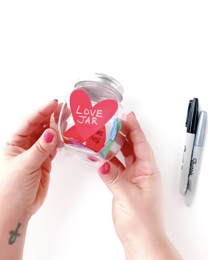 Stick a love heart to outside of jar