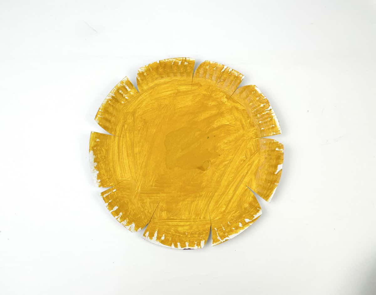 paint cut paper plate yellow for sunflower
