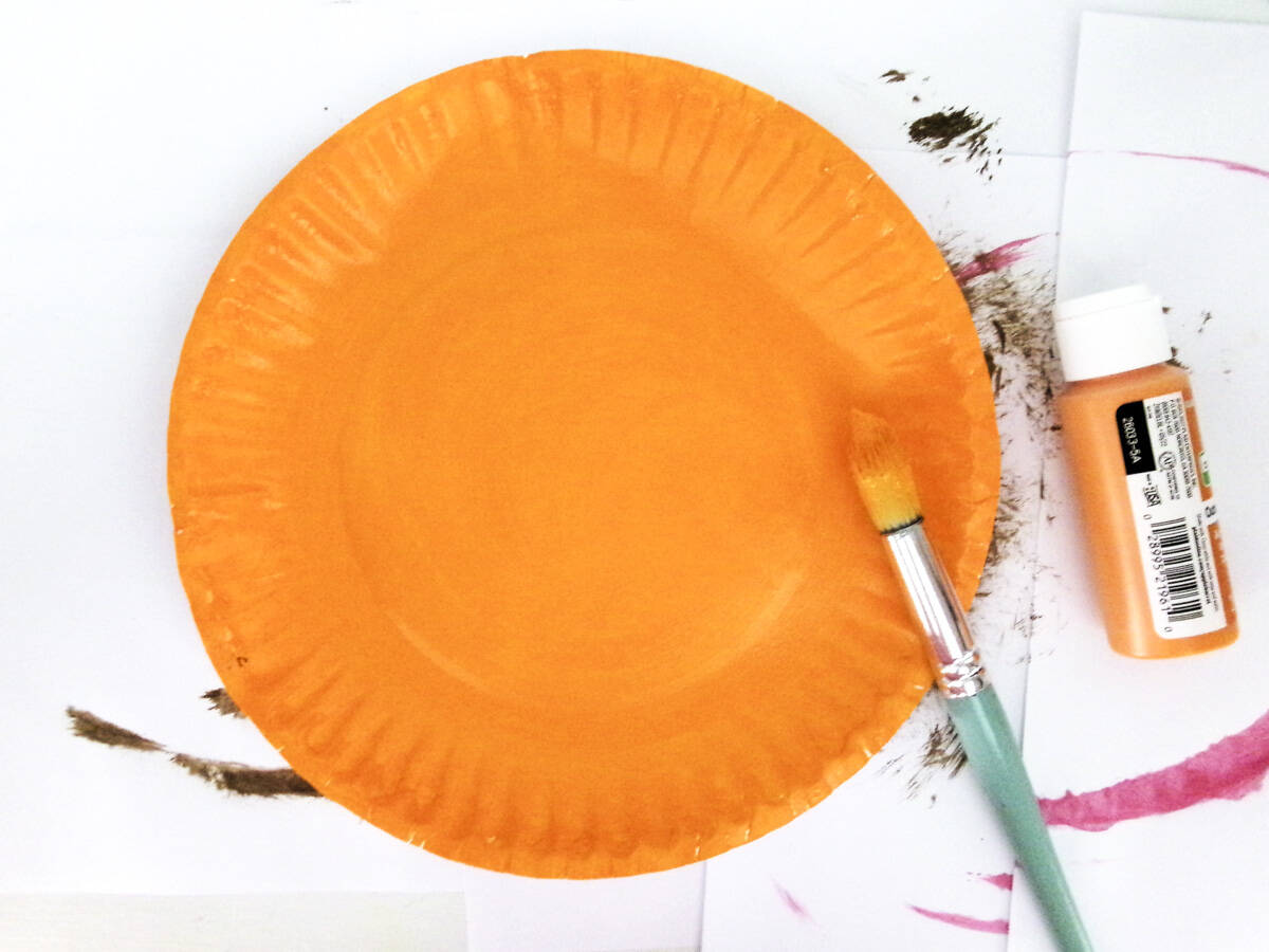 Paint front of paper plate orange