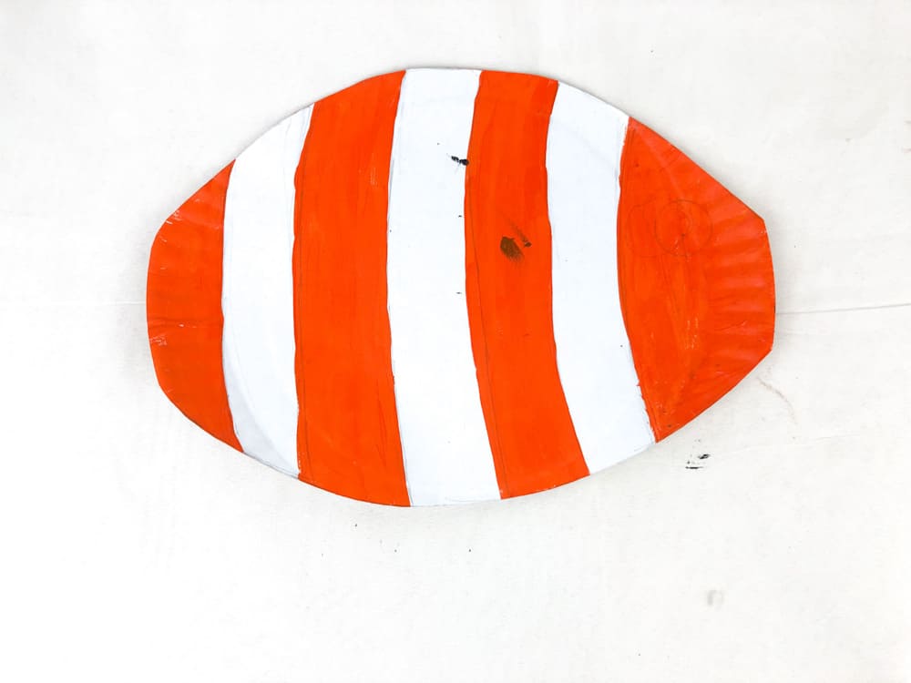 step 3 paint paper plate fish with striped paint