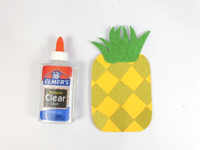 step6 glue green crown to top of pineapple