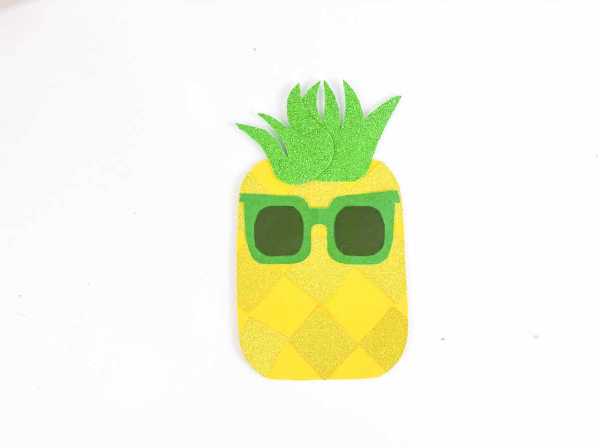 step 6 glue on sunglasses to pineapple