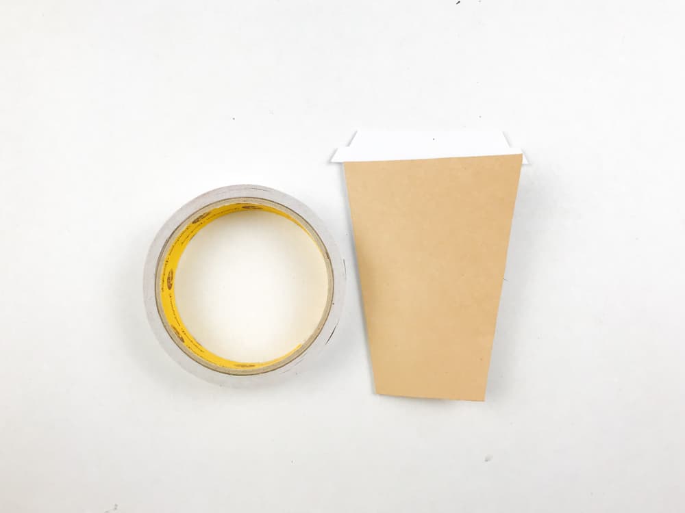 tape or glue brown card to coffee cup
