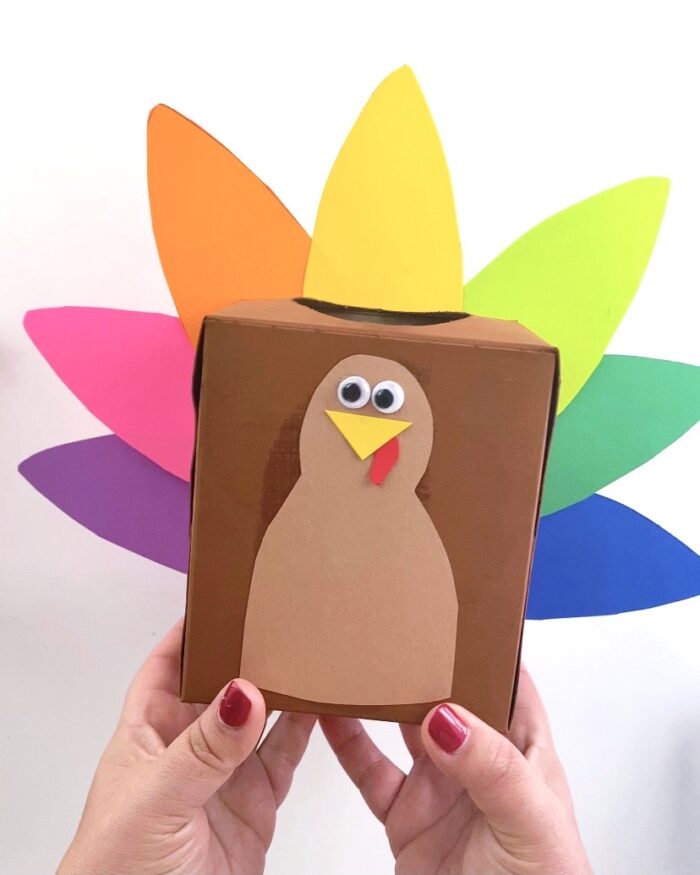 hands holding thankful turkey craft tissue box