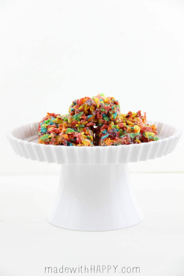 Fruity Pebbles Rice Krispie Treats Recipe - Rainbow Rice Krispie Treats displayed on white dish